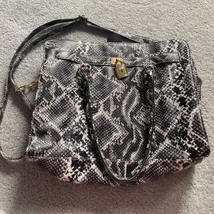 Women’s snake print bag